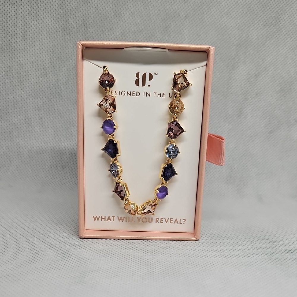 Elegant Gold and Purple Bracelet